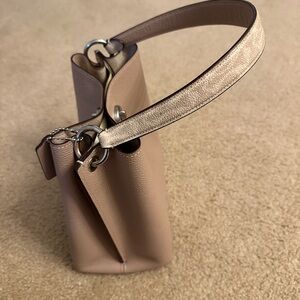 Coach tan versatile handbag purse